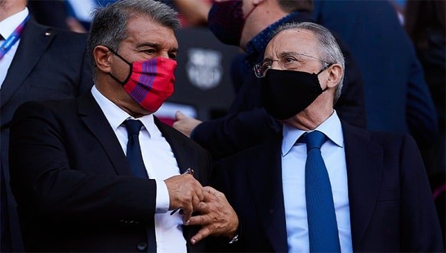 رئيس ريال مدريد فلورنتينو بيريز ورئيس برشلونة خوان لابورتا (غيتي)
