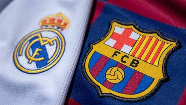 ريال مدريد وبرشلونة (غيتي)